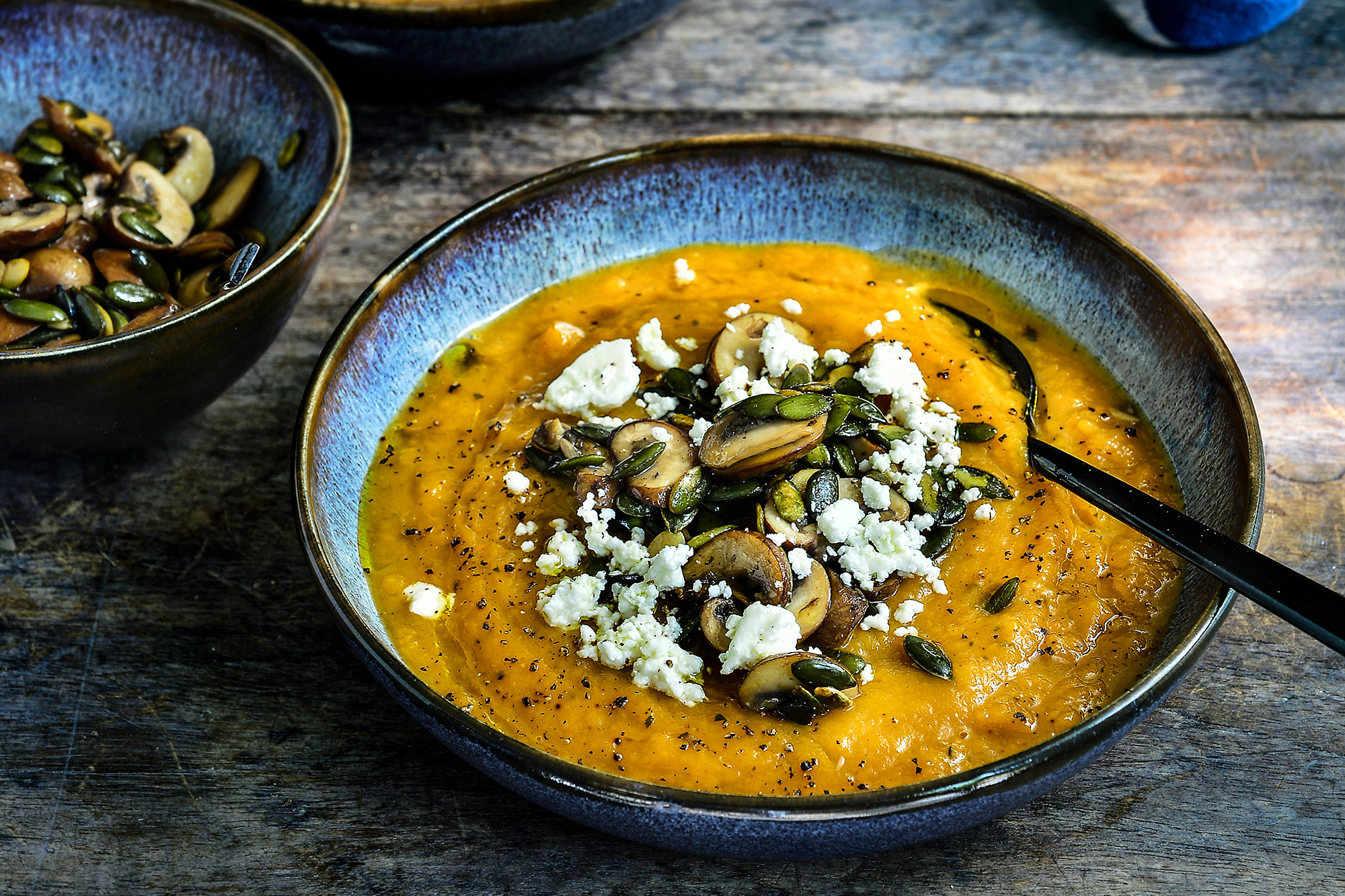 Pumpkin soup with mushrooms and feta cheese